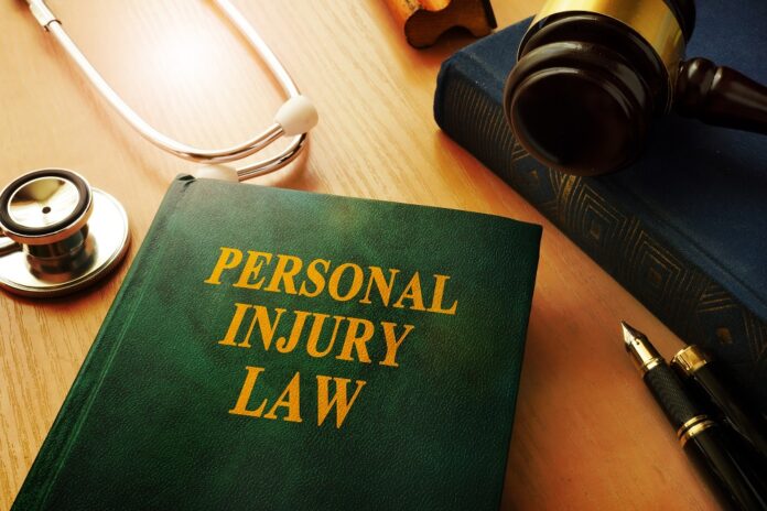 Personal injury law book on a table.